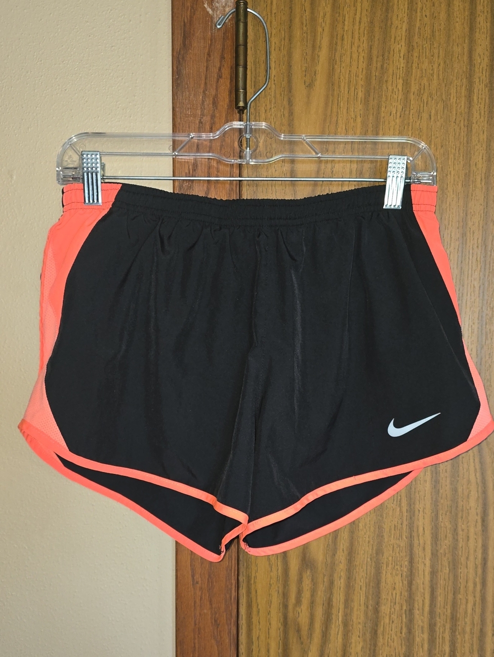 Nike Women’s Black and Coral-Orange Athletic Shorts